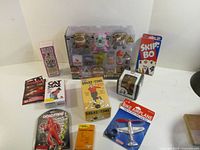 All ten packaged items arranged on white surface