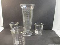 Group shot: 1000 mL cylinder and three beakers