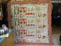 Front view of full quilt hanging to show pattern and size