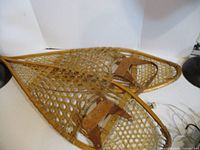 Full view of both snowshoes showing construction