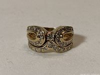 Front view of gold and diamond ring