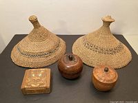 All five items: two straw hats and three wooden boxes