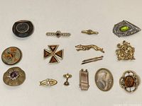 Front view of all brooches laid out