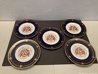 All five Royal Worcester plates displayed face up showing design and condition