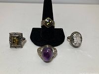 Group view of the four sterling silver rings