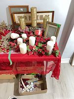 Overall lot with candles, frames, centerpiece on table