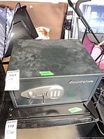 Front view of black SentrySafe with digital keypad and key lock