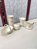 Group shot of five porcelain vessels