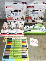 All boxed and blister-packaged art supplies displayed together