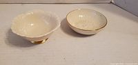 Both Lenox bowls, top view showing shapes and gold accents