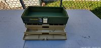 Plano 707 tackle box opened showing tiered trays and interior