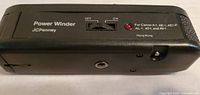 Top view of JC Penney Power Winder A showing label, on/off switch and compatibility text