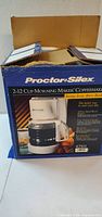 Front of original box showing Proctor-Silex Morning Maker coffeemaker model 42101