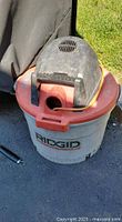 Vacuum assembled showing RIDGID logo, orange lid, black motor housing