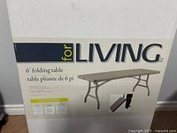Retail box showing For Living 6' folding table image and branding
