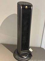 Front view of Airworks tower fan showing grille and base