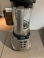 Full view of blender assembled showing base, jar and lid