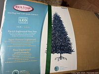 Box panel showing Holiday Living Pre-Lit Englewood Pine Tree details