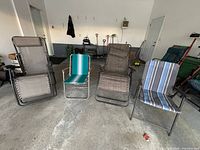 All four chairs side by side in garage