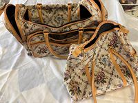 Both matching tapestry weekender bags, showing exterior pattern and size