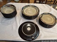Stacked dinner plates, salad plates, bowls showing pattern and counts