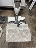 Full view of Shark steam mop with pad and accessory tray