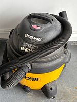 Full view of Shop-Vac Ultra vacuum with hose