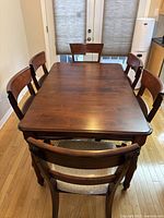 Dining table with six chairs, overall view