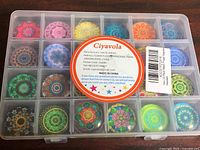 Closed plastic case showing 24 mandala magnets and Ciyavola label