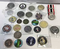 Overview of entire lot showing all coins and medal