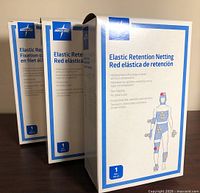 Front view of three Medline Elastic Retention Netting boxes