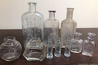 Group of all bottles and inkwells displayed