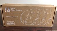 Closed retail box showing Flo by Moen Smart Water Detector 3-Pack graphics