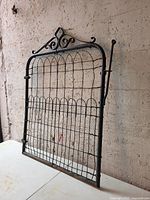 Full front view of gate showing overall design and condition