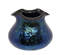 Front view showing iridescent oil-spot pattern and ruffled rim