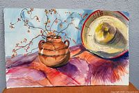 Full view of watercolor showing pottery, sombrero and blossoms