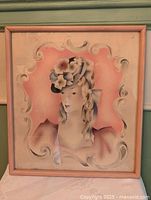 Full view of framed airbrushed portrait