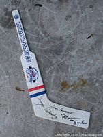 Full view of signed 16-inch mini goalie stick