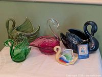 All five swan figurines grouped