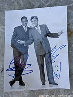 Full view of autographed 6x9 photo showing both signatures