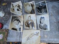 Group shot of six 8×10 photographs laid on table