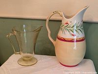 Both pitchers side by side showing size comparison and overall appearance