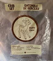 Baby Dear crib set original packaging showing branding and care details