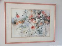 Full view of framed watercolor in pink frame