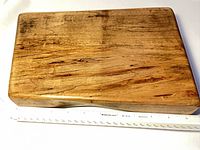 Top view of rectangular spalted maple board with ruler showing size