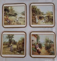 All four Pimpernel square coasters displayed
