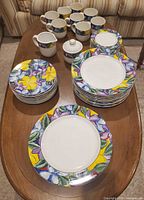 Full 35-piece stoneware set arranged on table