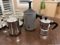 All three items on table showing relative sizes and finishes