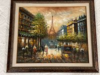 Full view of framed oil Paris street scene painting