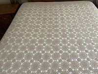 Bedspread on bed showing full top view